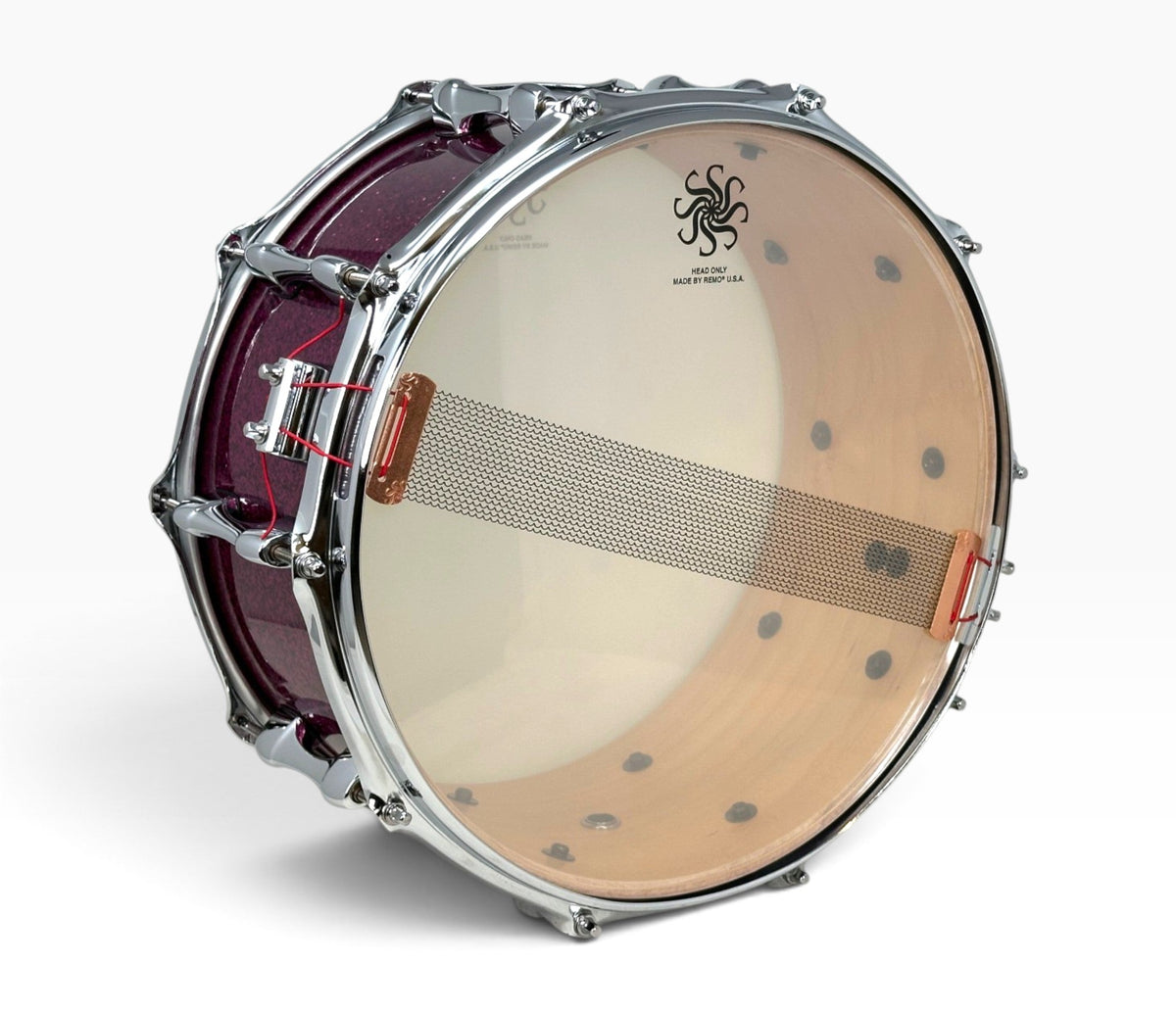 Sakae Evolved 14" x 6.5" Snare Drum in Magenta Sparkle – resonant head and snare wires