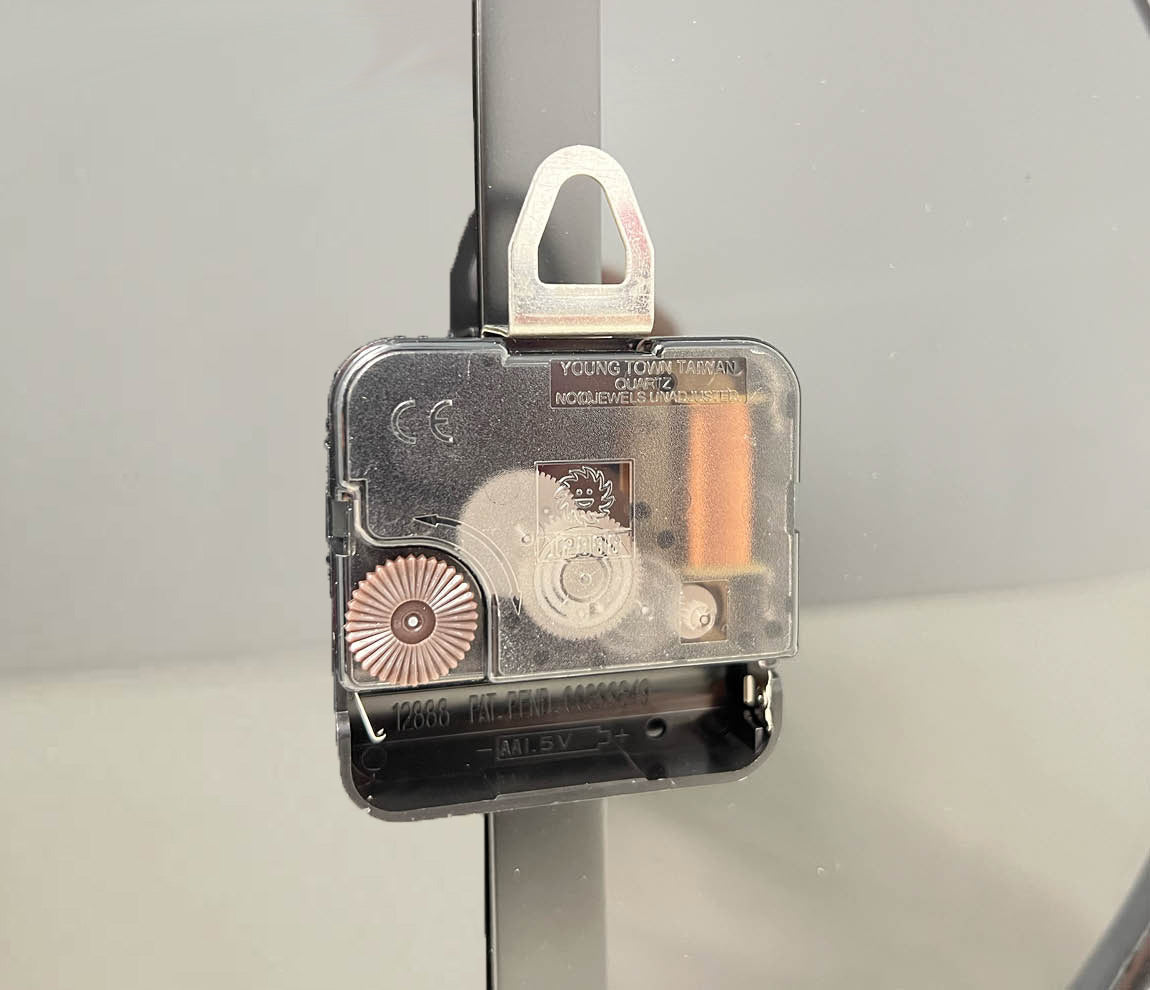 Battery box and wall mounting on Rogers Drum Head Inspired Wall Clock