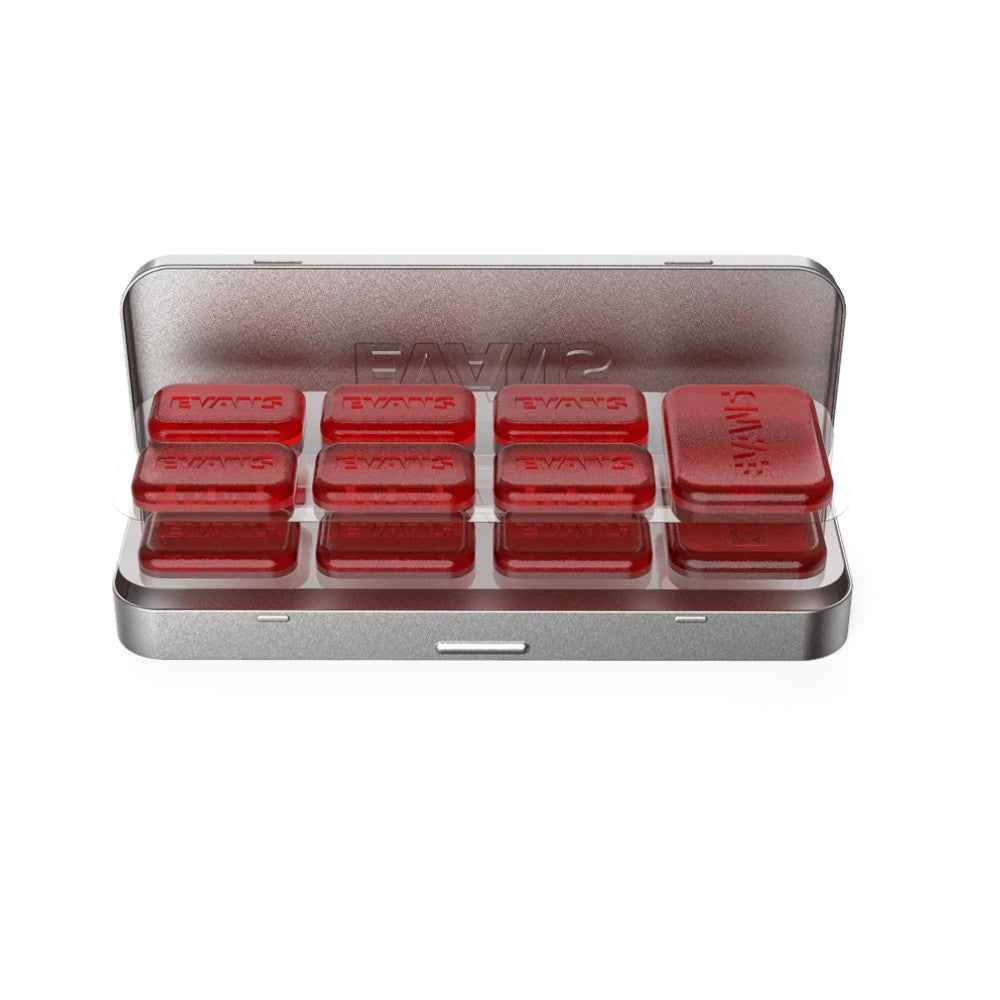 Evans Mini EQ Pods arranged inside the metal storage tin