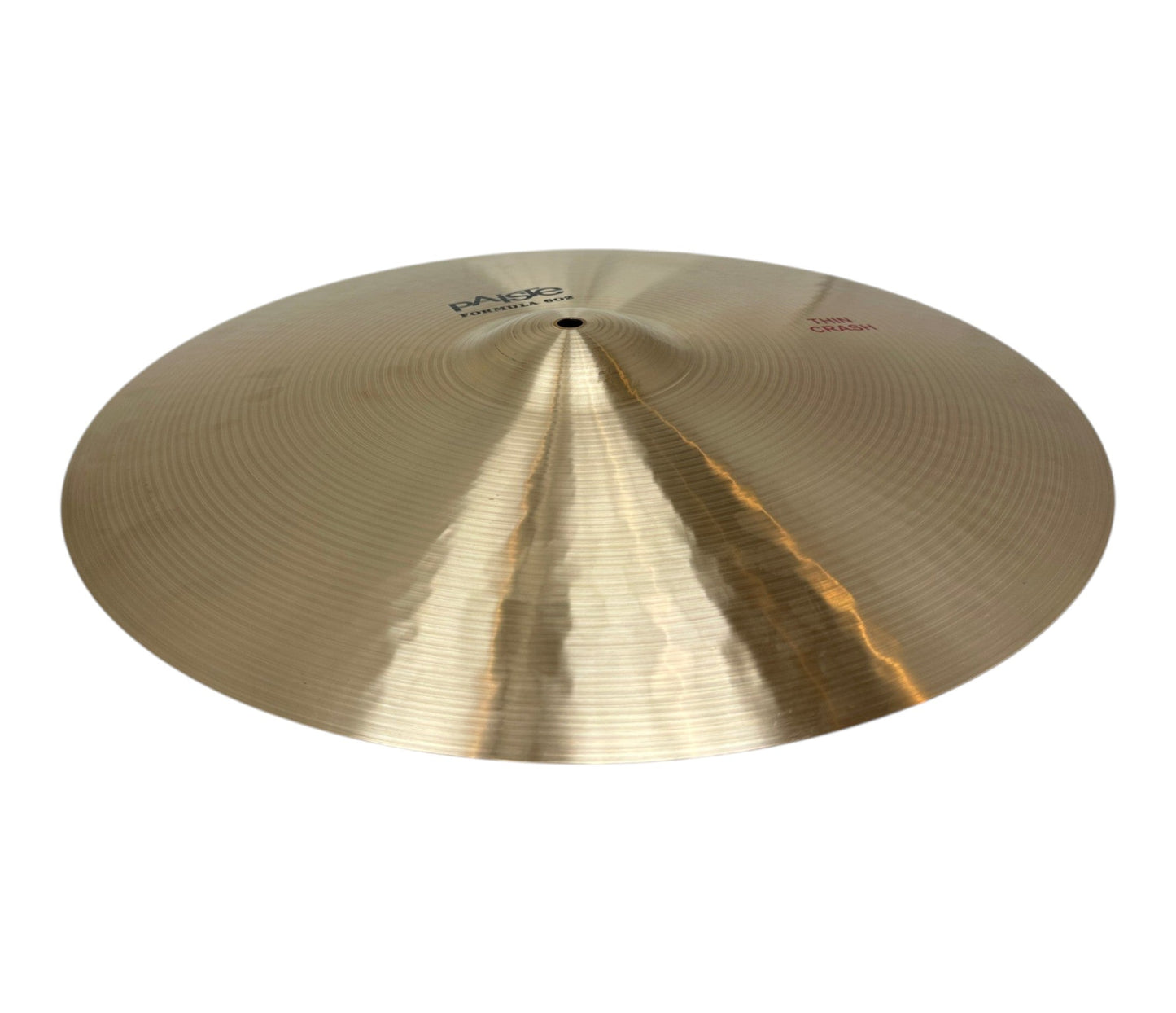 Close-up of the Paiste Formula 602 branding and cymbal surface