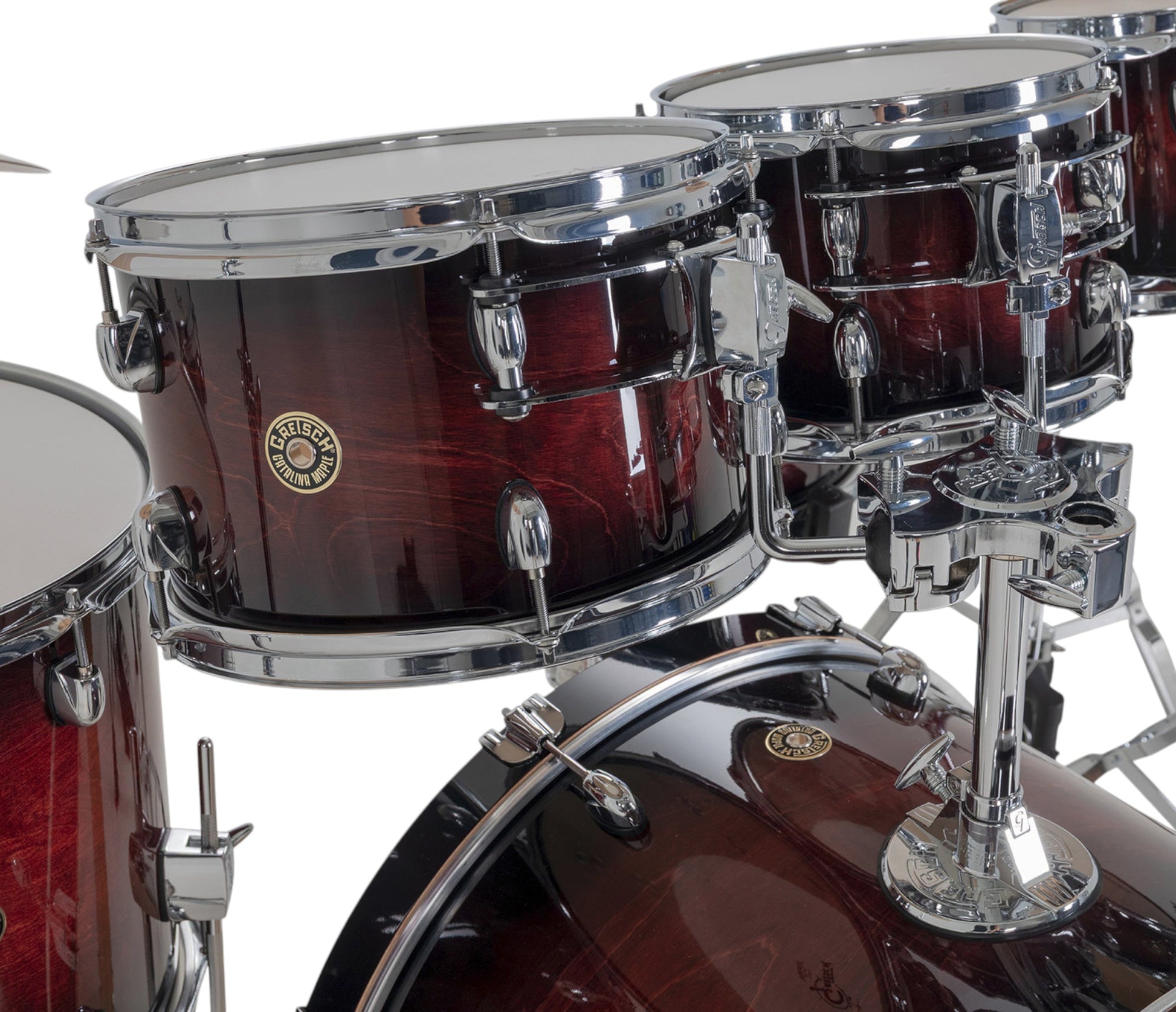 Gretsch Catalina Maple 22" 7-piece drum kit in Deep Cherry Burst – bass drum-mounted multi-tom holder close-up