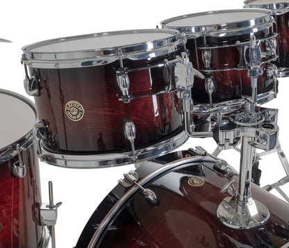 Gretsch Catalina Maple 22" 7-piece drum kit in Deep Cherry Burst – bass drum-mounted multi-tom holder close-up