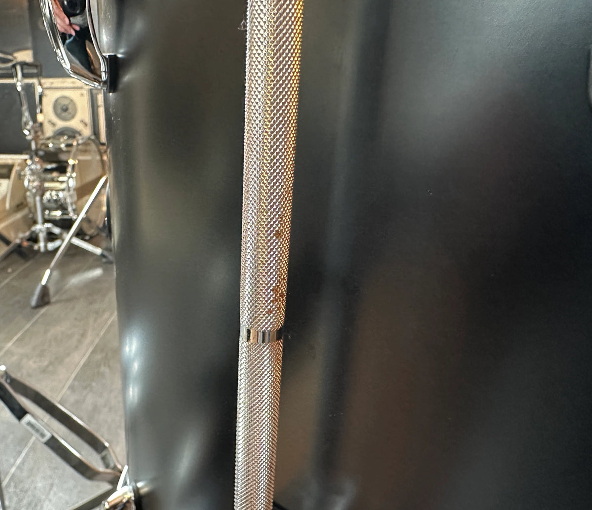 Close-up of Pearl Masters bass drum shell finish and chrome detail