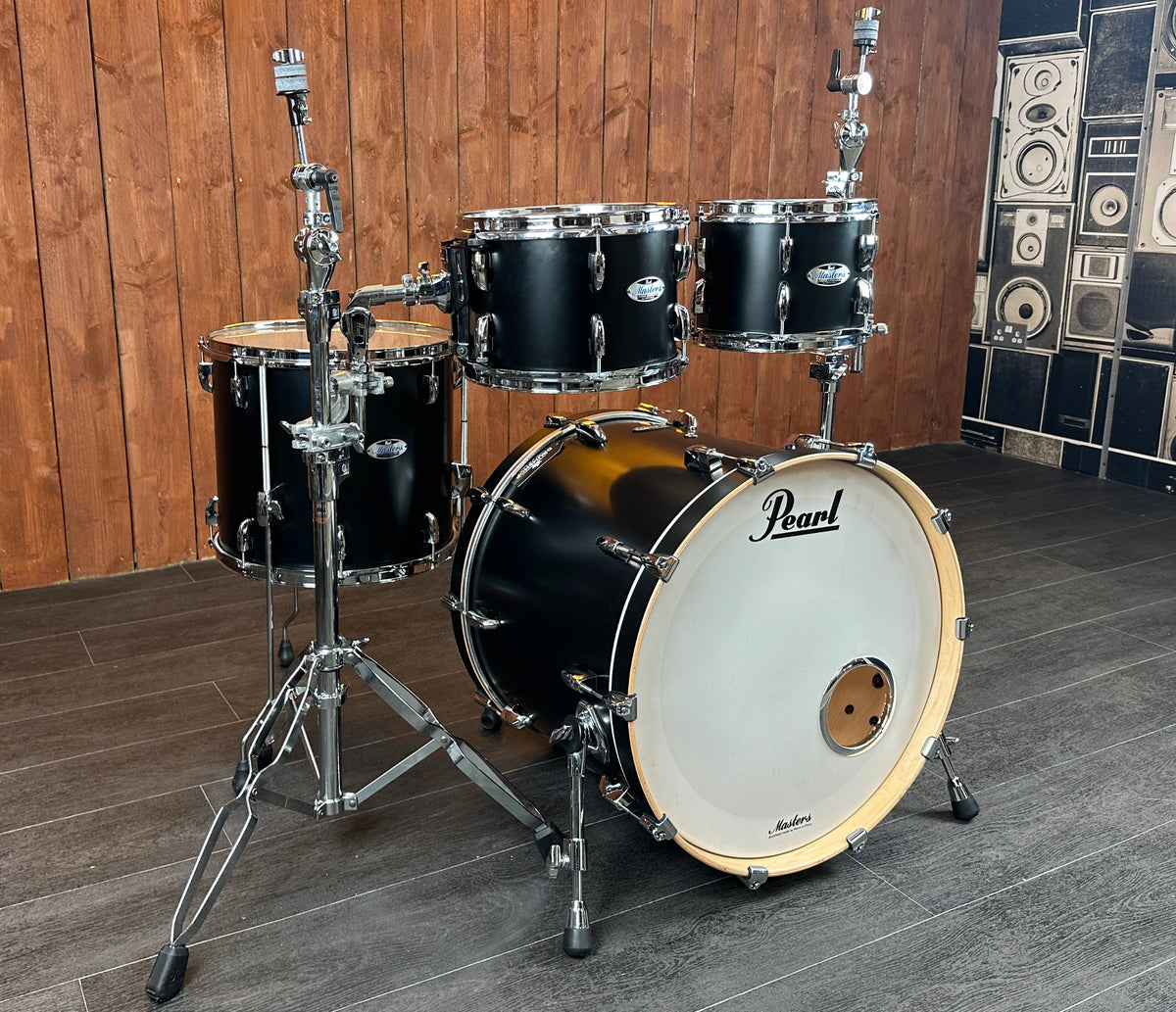 Pre-loved Pearl Masters four-piece drum kit with 22-inch bass drum, side angle