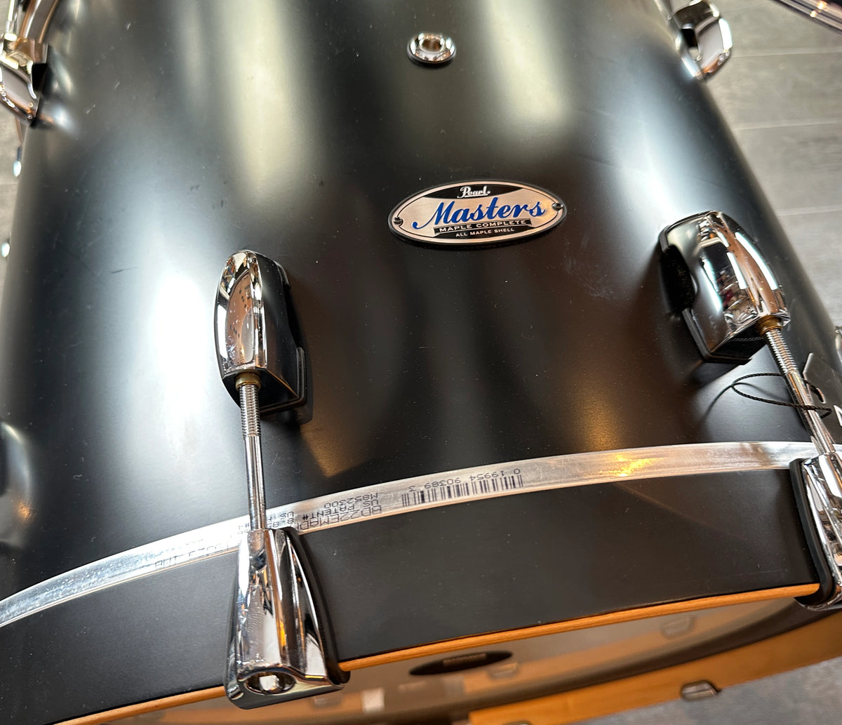 Pearl Masters bass drum shell in Matt Caviar Black with badge and chrome hardware