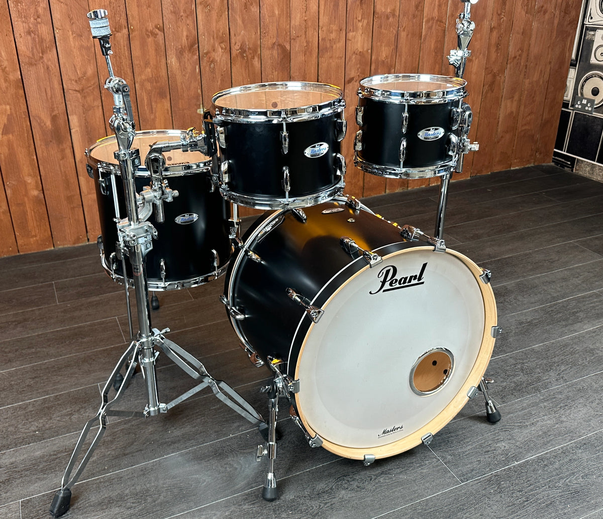 Pearl Masters four-piece shell pack with bass drum and toms, left angled view