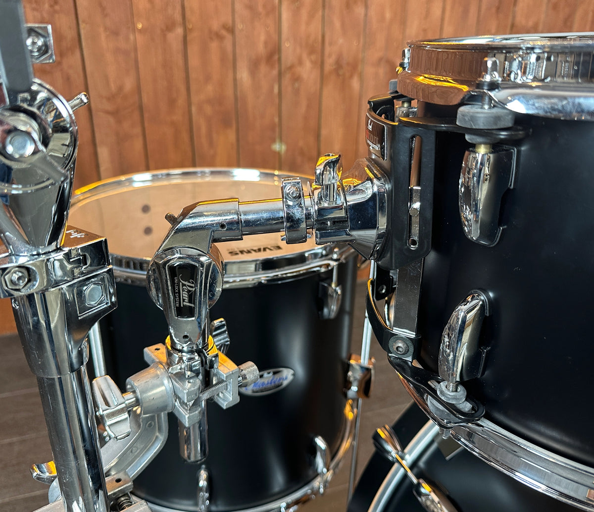 Close-up of Pearl Masters rack tom mounting hardware