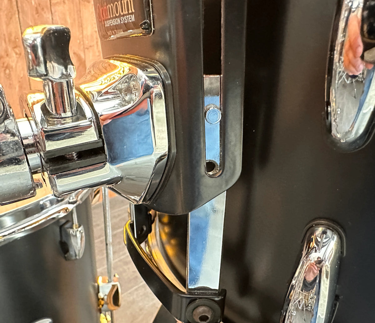 Close-up of Pearl Masters rack tom mount and mounting screw detail