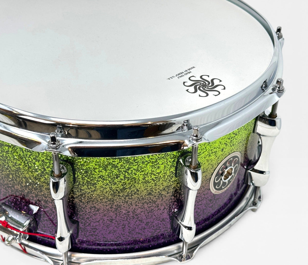 Sakae Evolved 14" x 6.5" Snare Drum in Grapes Green to Purple Sparkle – close-up of batter head and shell