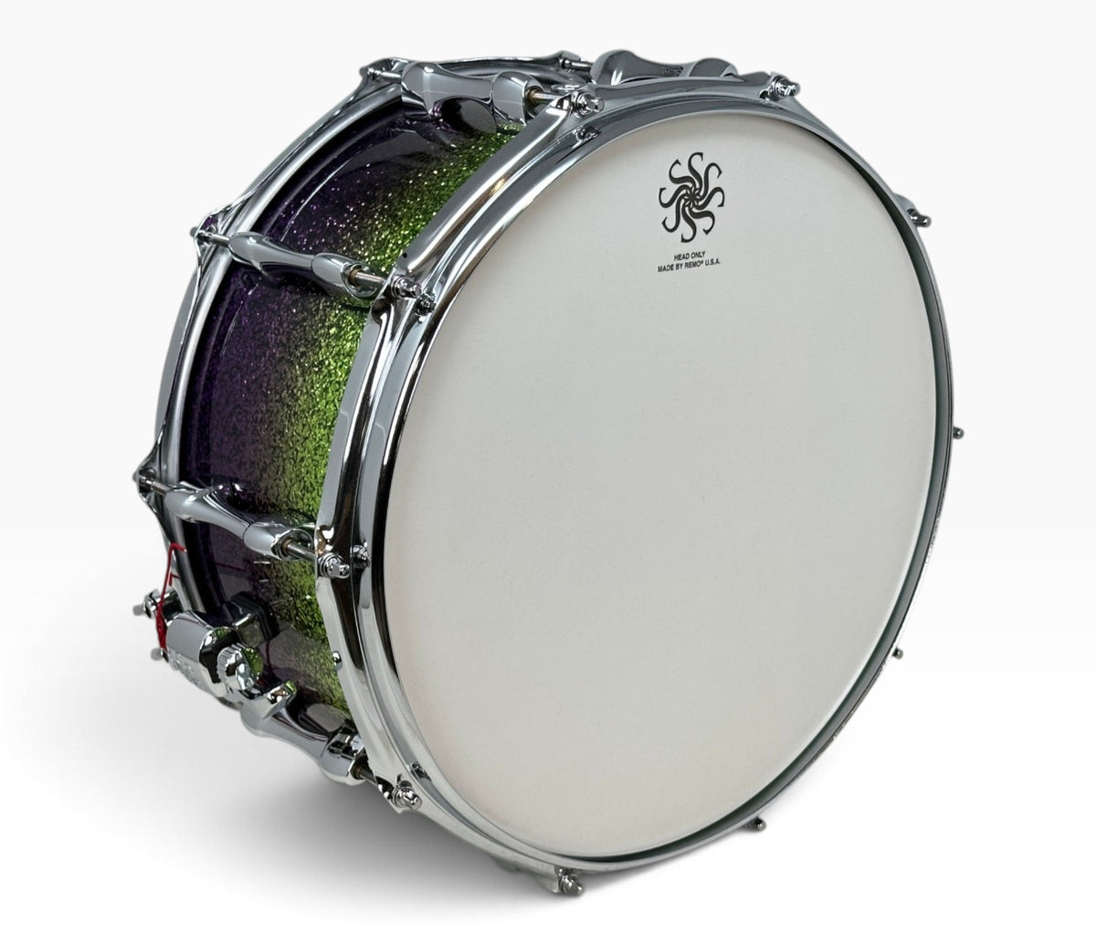 Sakae Evolved 14" x 6.5" Snare Drum in Grapes Green to Purple Sparkle – angled batter head view