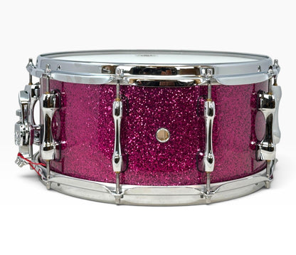 Sakae Evolved 14" x 6.5" Snare Drum in Magenta Sparkle – side view with shell air vent