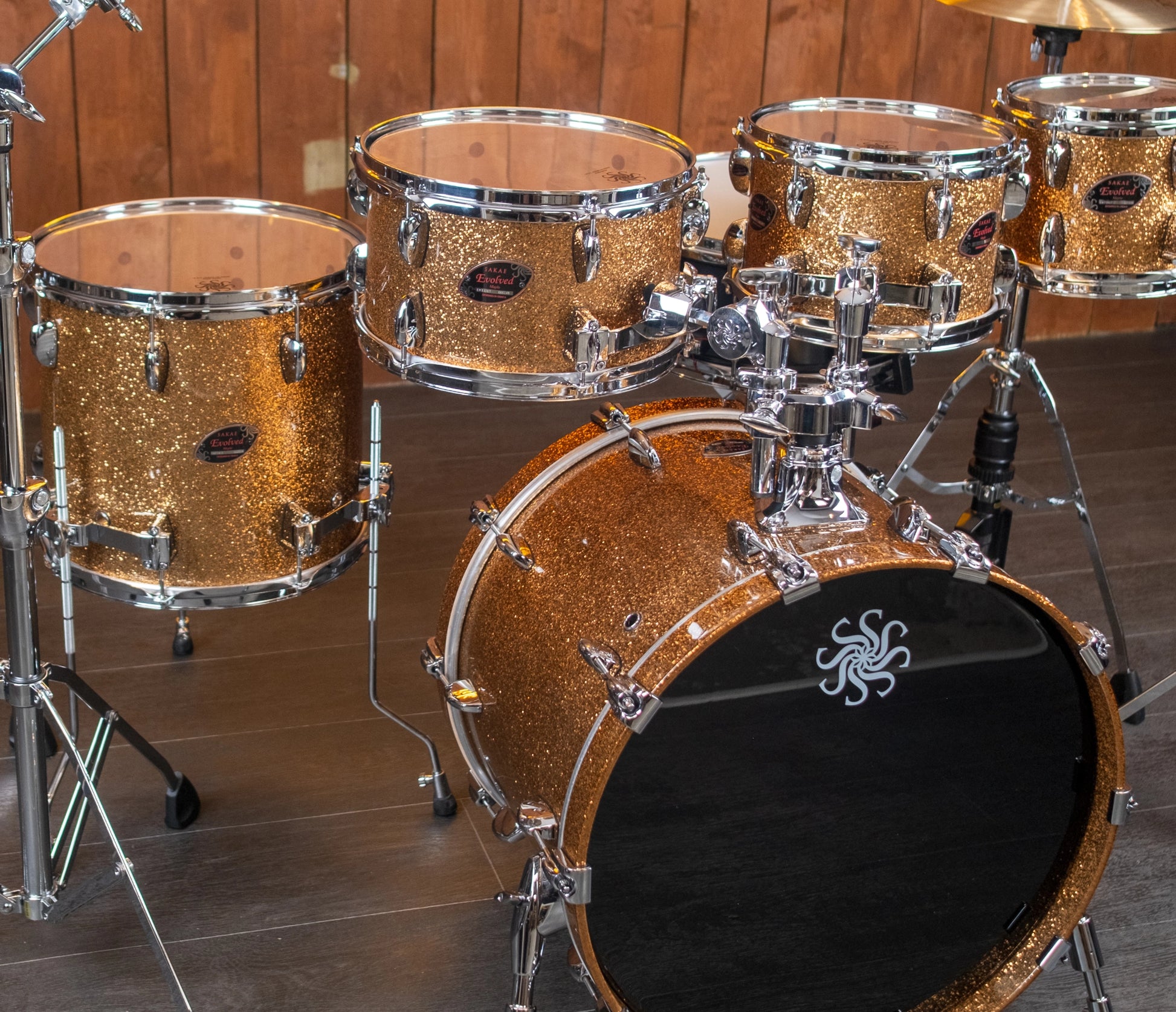 Sakae Evolved Gen2 Gold Champagne Sparkle shell pack – wide front view