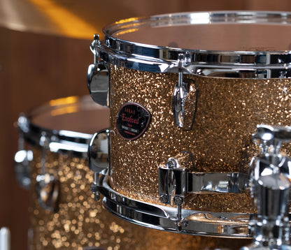Sakae Evolved Gen2 rack tom and shell badge in Gold Champagne Sparkle