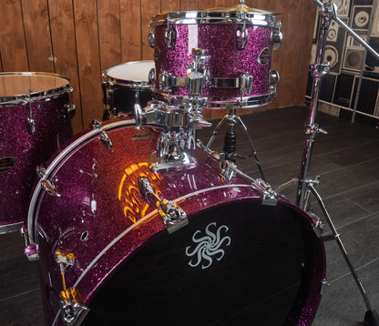 Sakae Evolved Gen2 tom and 22-inch bass drum in Magenta Sparkle