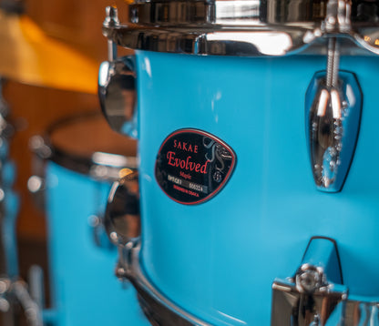 Sakae Evolved Gen2 badge on Sonic Blue Lacquer maple shell