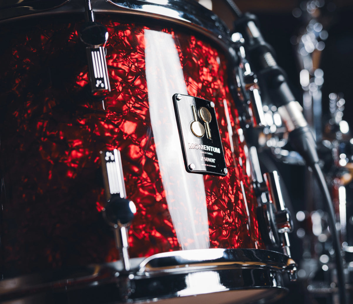 Sonor Momentum 22" 3-Piece Shell Pack in Red Pearl – tom shell and chrome hardware close-up